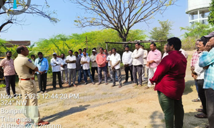 Boinpalli SI Ramakanth addressing tractor drivers during a traffic awareness session at the police station.