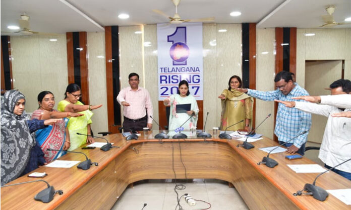 District Collector Pamela Satpathy administering the Constitution Day pledge to officers and staff at Karimnagar Collectorate.