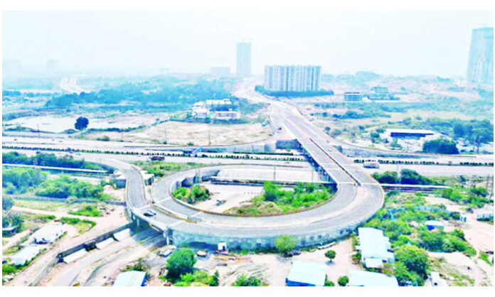 Aerial view of Kokapet Neopolis layout in Hyderabad where HMDA land auction achieved a record price of Rs 137.25 crore per acre, attracting major real estate developers.