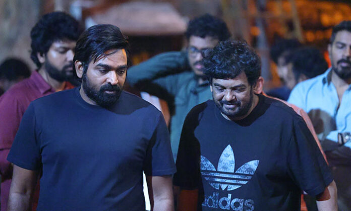 Emotional moments from the final shooting day of Puri Sethupathi movie featuring Vijay Sethupathi, Puri Jagannadh, and Charmi Kaur as they complete the pan-India film shoot.