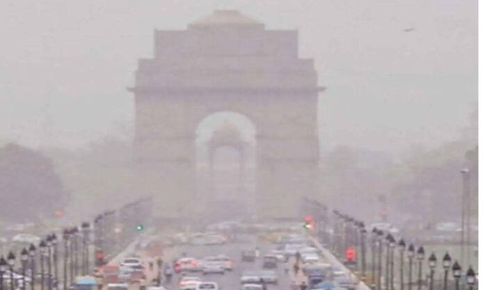 Smog-covered Delhi cityscape showing extremely poor air quality and reduced visibility.