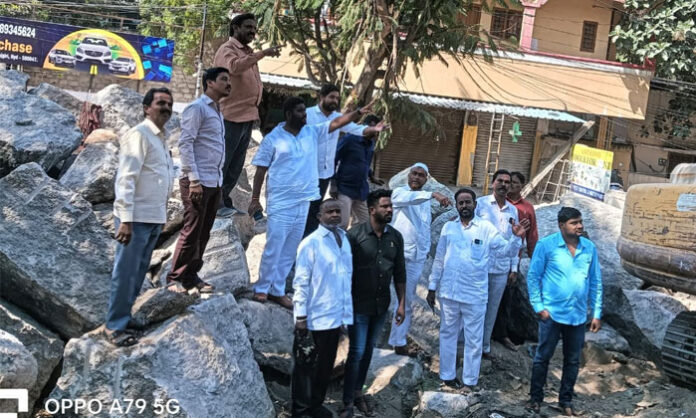 malkajgiri-road-restoration-congress-ghmc-inspection