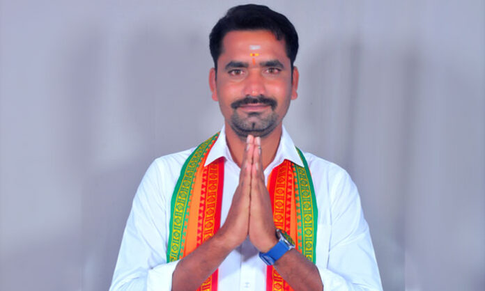 Image showing BJP Sarpanch candidate Meghavath Ramesh Naik addressing villagers in Loyapalli, highlighting his CRPF service background and commitment to village development.