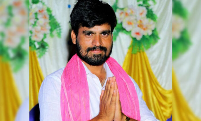 Image showing BRS candidate P. Hanumantu Naik celebrating victory after winning the Jinkalaveedu Thanda Sarpanch election in Gopalpet mandal.