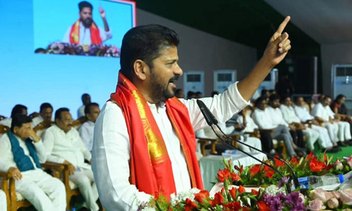 CM Revanth Reddy addressing public and officials during his visit to Adilabad district.