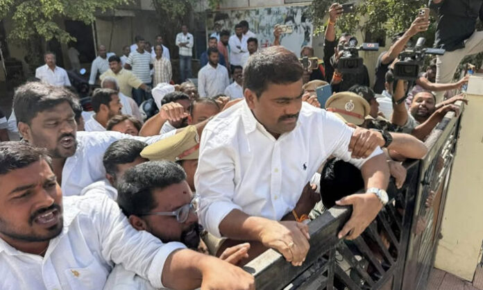 Congress leaders and cadres protest in Karimnagar against alleged political vendetta in the National Herald case under the leadership of Medipalli Satyam.
