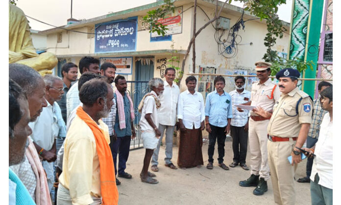 DSP Balaji Nayak inspecting polling station security in Madanapuram mandal and warning strict action against any attempts to disrupt Gram Panchayat elections.