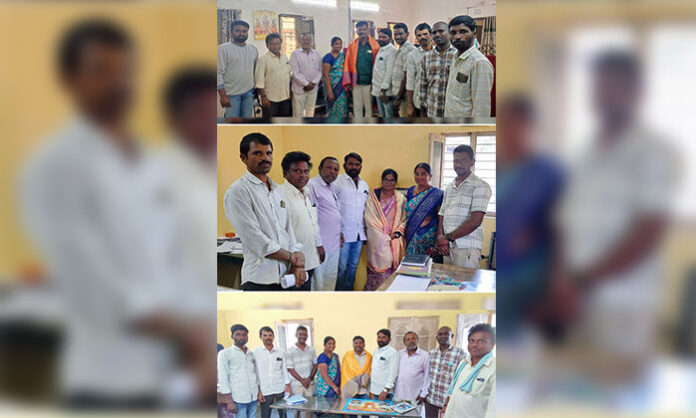 Gopanapalli village Sarpanch Vijaya Ashok felicitating Parvathagiri Mandal officials with shawls
