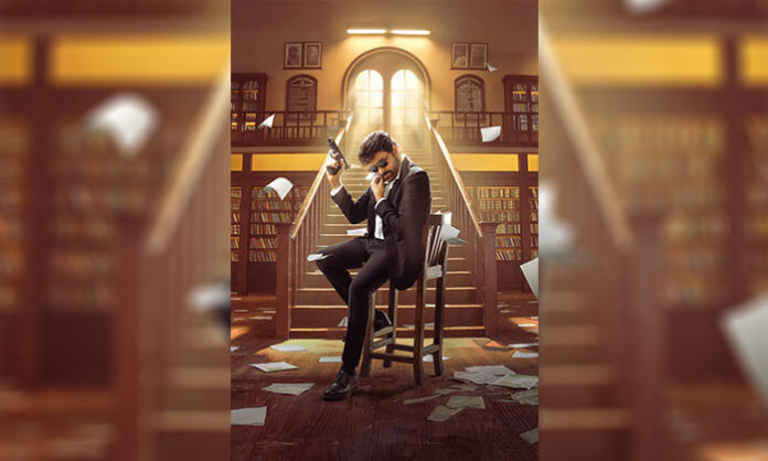 Megastar Chiranjeevi in a stylish black suit holding a gun in Mana Shankara Vara Prasad Garu movie still