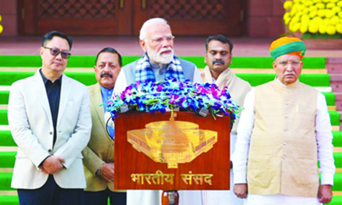 Prime Minister Narendra Modi addressing the winter session of Parliament, urging opposition MPs to focus on national development and constructive discussions.