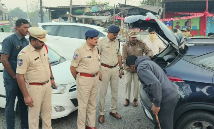 DCP Ram Reddy overseeing police vehicle checks in Godavarikhani ahead of New Year celebrations to ensure safety and enforce rules