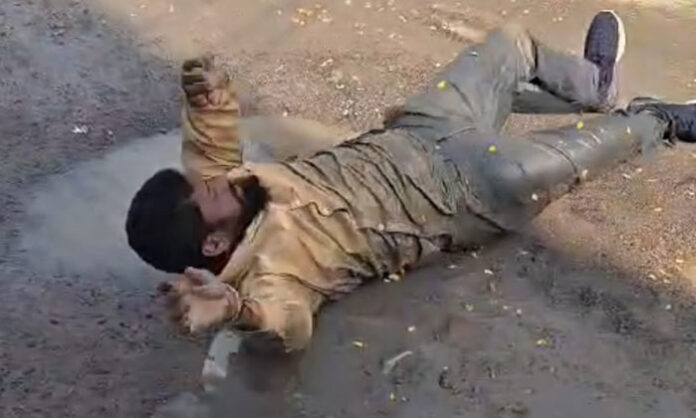 BJP leader Somidi Venu Prasad staging prostration protest over road and drainage problems in Kisan Nagar, Karimnagar
