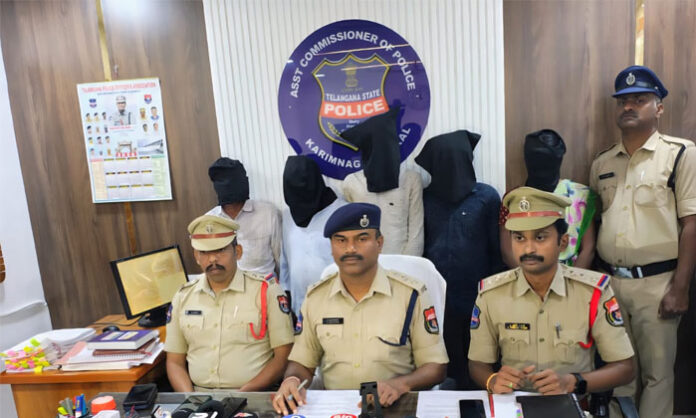 Police presenting five accused arrested in the Ramadugu mandal crime case related to Gade Anjayya