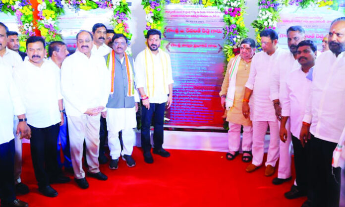CM Revanth Reddy addressing a public meeting in Husnabad, announcing 40,000 new jobs and launching major development projects.