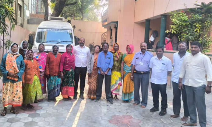 Members of Suraksha Seva Sangam supporting elderly patients who received free eye surgeries under the Suraksha Kanti Velugu program at Pushpagiri Eye Hospital, Secunderabad.