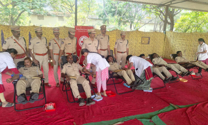 Telangana Home Guards celebrating the 63rd Rising Day with parade events and a successful blood donation camp.