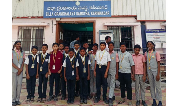 Vision High School students visiting Karimnagar Fire Station and District Library during an educational field trip.
