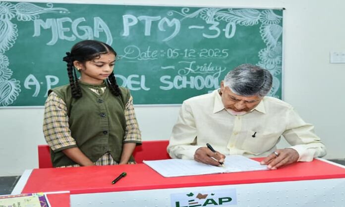 chandrababu with a student in class room