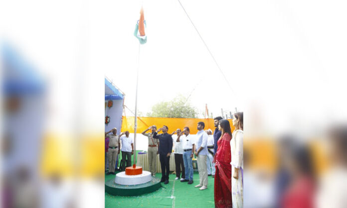 National flag hoisting at Mulugu district headquarters and village offices during 77th Republic Day celebrations
