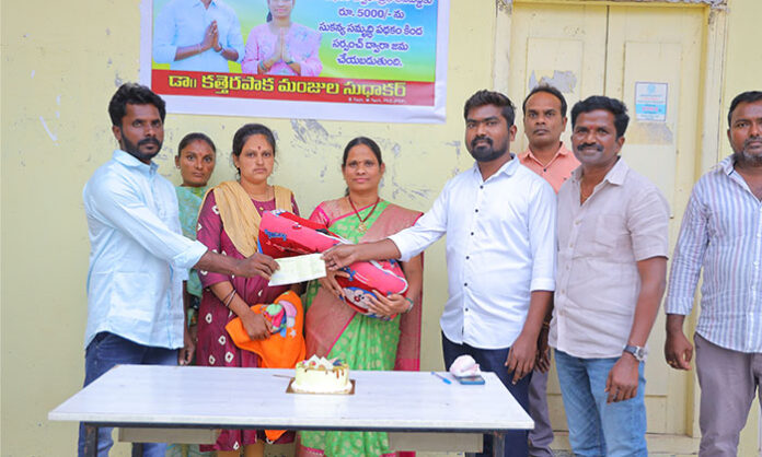 Kodurapaka Sarpanch Manjula Sudhakar launching Aadabidda Bharosa scheme by depositing Rs 5000 in Sukanya Samriddhi account