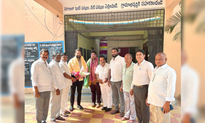 BRS leaders felicitating Deputy Commissioner Sudhanshu during his visit to Gowdavelli village in Medchal circle