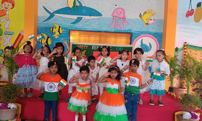 Billy Bears Pre-School students and staff celebrating the 77th Republic Day with national flag hoisting in Bandlaguda