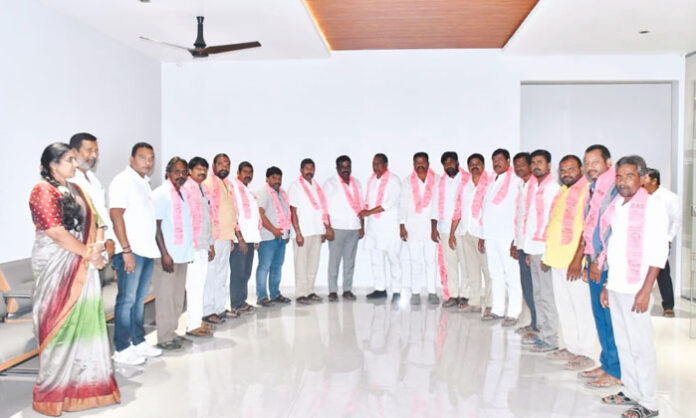 Congress and BJP leaders joining BRS in the presence of Medchal MLA Mallareddy ahead of municipal elections