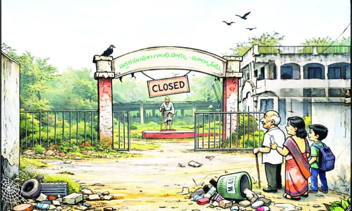 Neglected Gandhi Park in Suryapet town with Mahatma Gandhi statue amid lack of maintenance