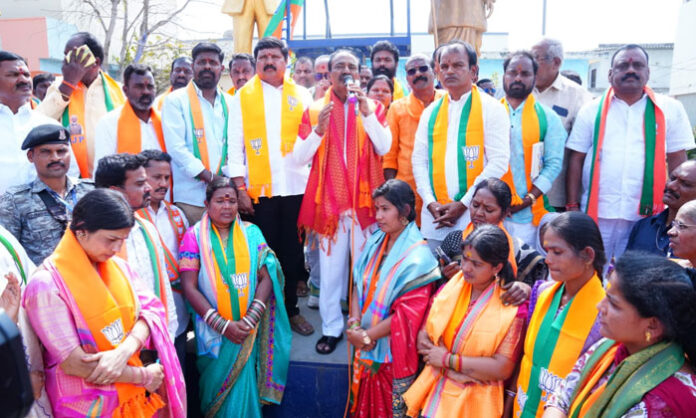 Malkajgiri MP Etela Rajender supporting BJP councilor candidates during nomination filing at Dabilpur village