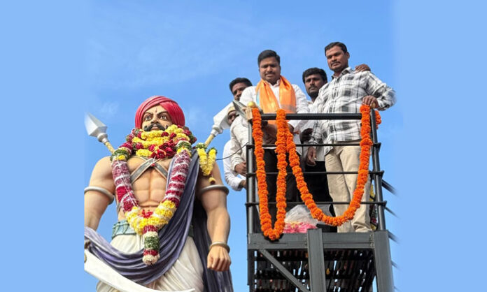 Leaders unveiling the Madelayya Rajaka Association 2026 calendar in Jawahar Nagar.