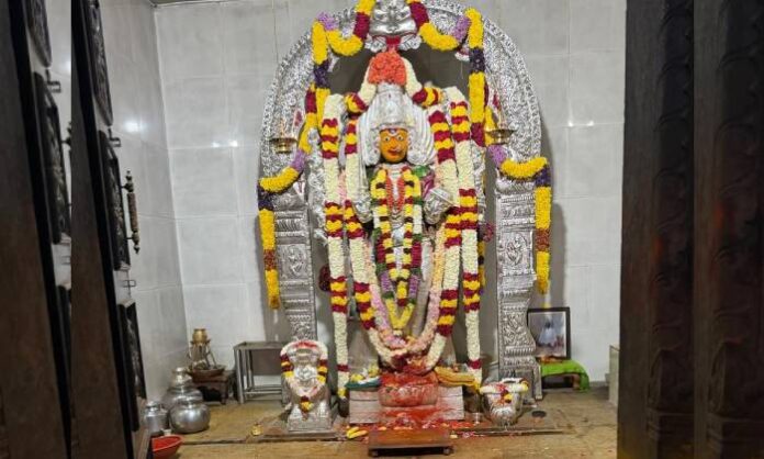 Devotees gathering at Sri Chamundeshwari Temple during Magha Amavasya celebrations on the banks of Manjeera River