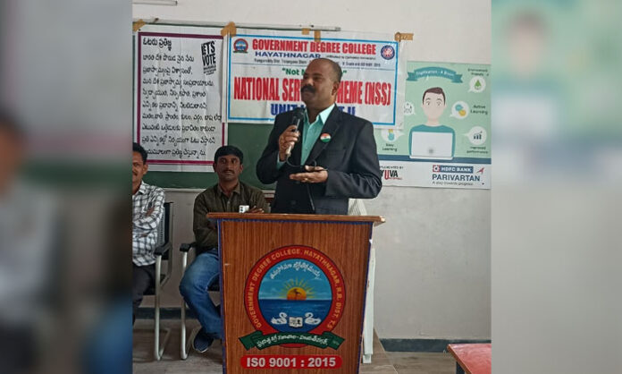 Advocate Kikkara Gopi Shankar Yadav addressing students on the importance of voting at Hayathnagar Government Degree College on National Voters Day