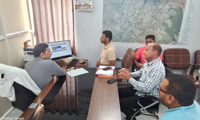 Election officials inspecting polling station arrangements in Moinabad municipality