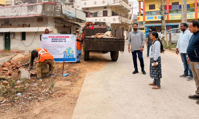 Deputy Commissioner Sudhansh supervising a special sanitation drive in Medchal circle under Quthbullapur zone.