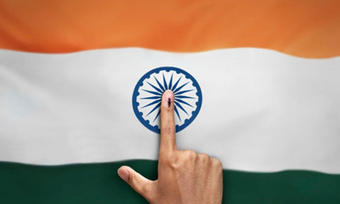 People waiting in line to vote reflecting on political responsibility