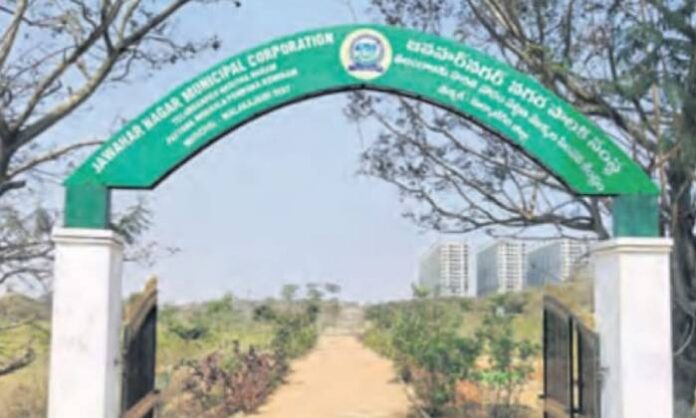 Government land encroachment in Jawahar Nagar Survey Number 648 within GHMC limits