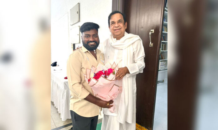 Advocate Magapu Bhanu Sundar presenting a bouquet to Telugu comedy legend Brahmanandam on his birthday