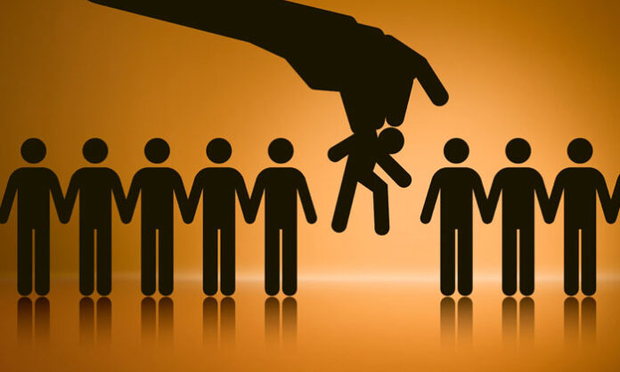 Women and family members carrying the coffin during a caste discrimination funeral incident in Kandanakunta village, Jagtial district