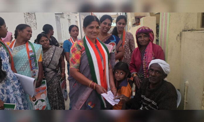 Congress councillor candidate Cheguri Aruna Ramakrishna Goud campaigning door to door in Ward 18 of Peddamangalar