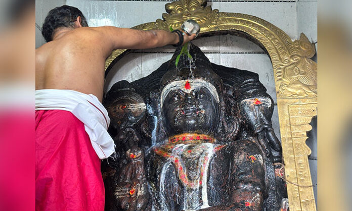 Devotees visiting Yama Dharmaraja temple during Dharmapuri Brahmotsavam