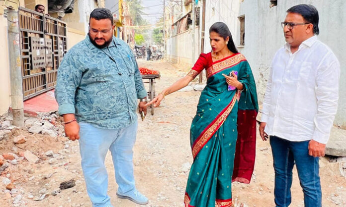Corporator Dr. Samala Hema inspecting CC road works and community hall construction in Sitaphalmandi, Secunderabad