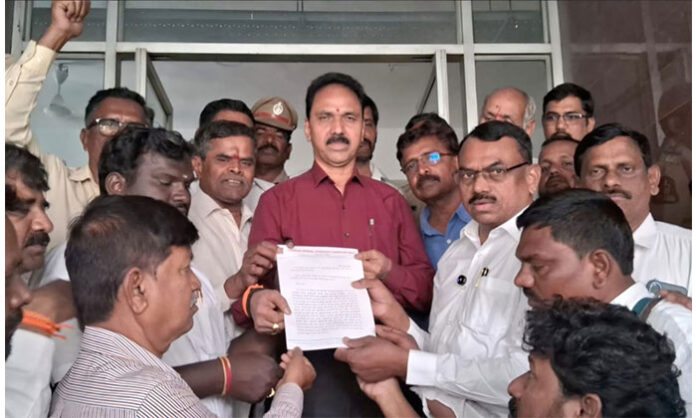 Journalists of small and medium newspapers protesting at Samachar Bhavan in Hyderabad demanding accreditation and government support