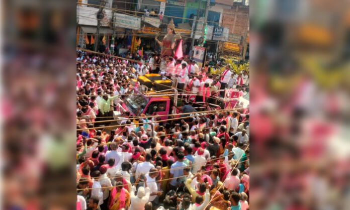 Former minister KTR addressing a massive roadshow during Narsampet municipal elections criticising Revanth Reddy government