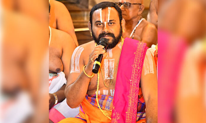 Priest Kiran Kumar Chary receiving chief priest appointment at Yadagirigutta Sri Lakshmi Narasimha Swamy Temple during Brahmotsavam celebrations.