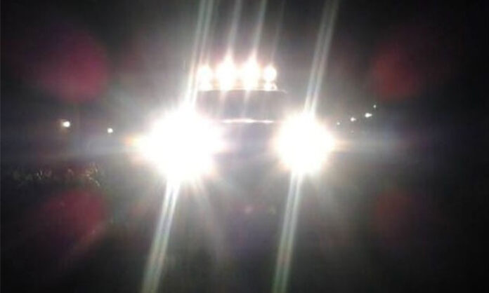 Bright LED headlights from oncoming vehicles causing glare and visibility issues for drivers on Telangana roads at night.