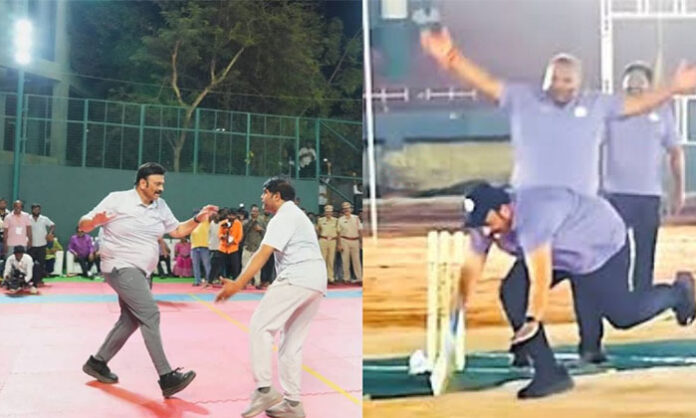 Raghuramakrishna Raju being assisted after a fall during a cricket match at Amaravati sports event