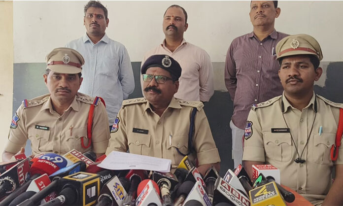 Police presenting recovered gold jewelry after arresting a maid in a theft case in Habsiguda