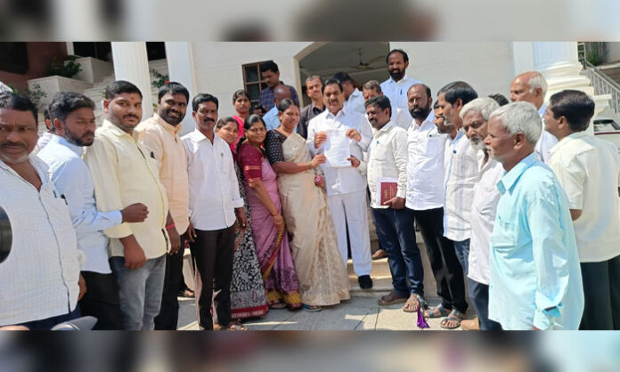 Majidpur Sarpanch Medipalli Priya Chandrasekhar and villagers submitting a petition to Ibrahimpatnam MLA Malreddy Ranga Reddy regarding graveyard land allotment issue