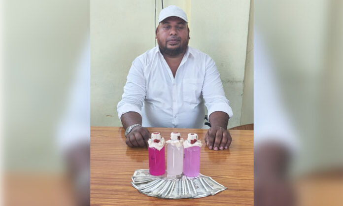 Telangana ACB officials arresting Gurrampode Mandal Revenue Inspector Mohammed Abdul Hakeem while accepting bribe at MRO office in Nalgonda district