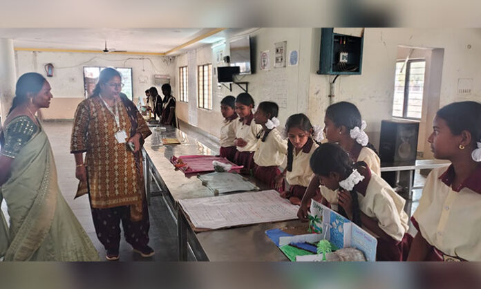 Students presenting science models and experiments during National Science Day celebrations under the guidance of Principal P Aparna at PM Sri TG SWRS Junior College in Warangal district